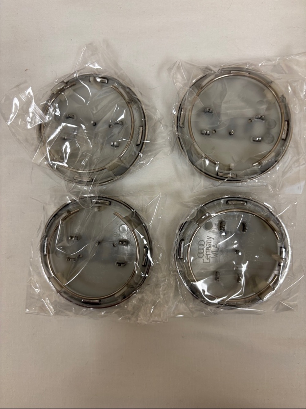 Audi Wheel Center Caps Set - Metallic Gray with Chrome Rings (4pcs) - Picture 4 of 5